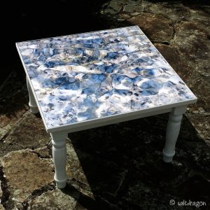 Square coffee table featuring Stream of light at Porth Nanven