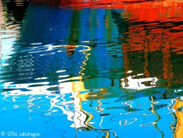 Reflections of a fishing boat