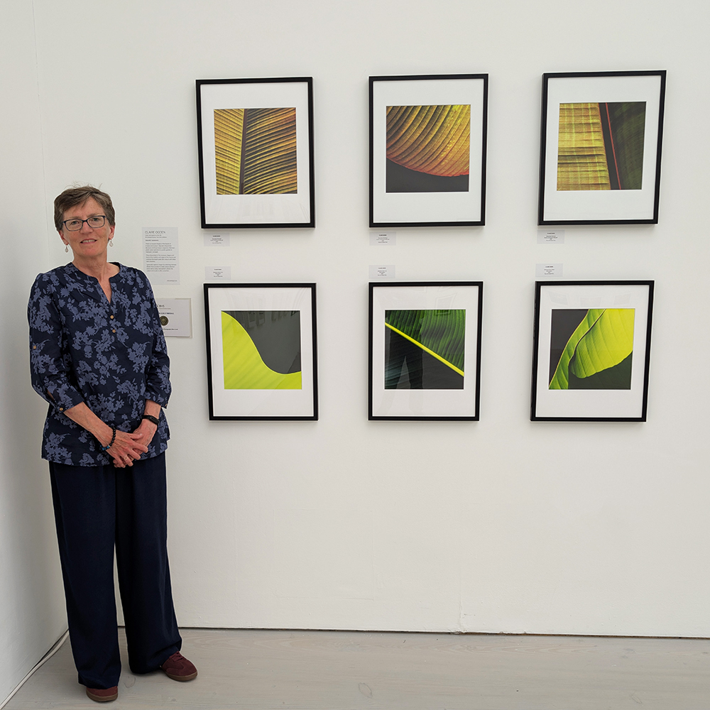 Claire Ogden standing beside "Square Bananas" RHS Photography Portfolio 2026 at Saatchi Gallery