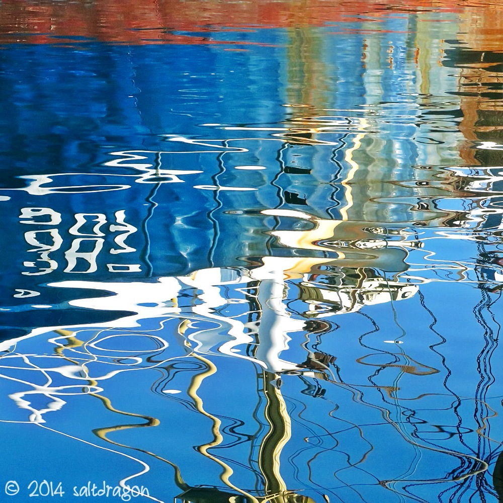 reflections of Jacoba in harbour water